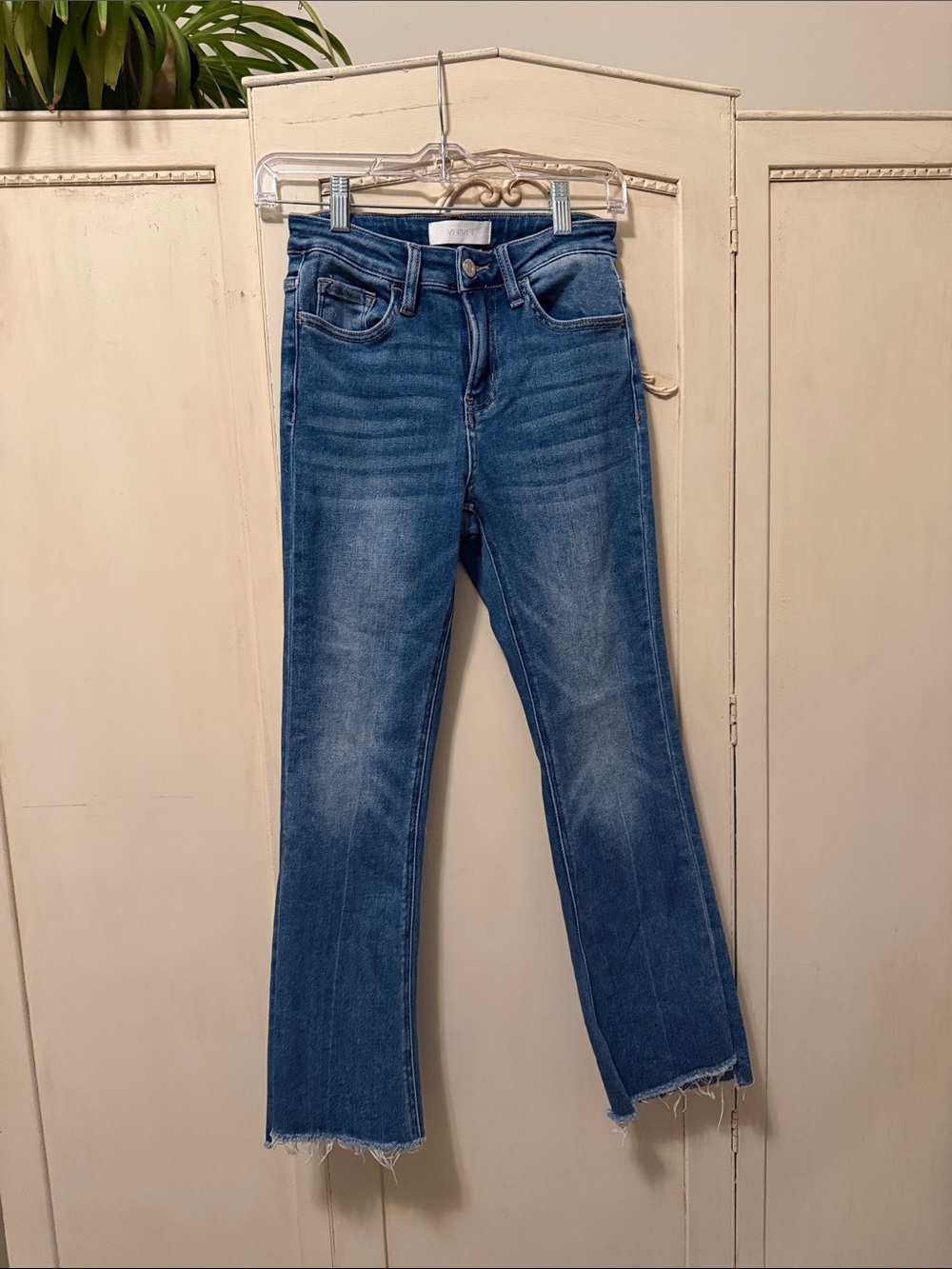 High-Rise Blue Flare Jeans with Raw Hem